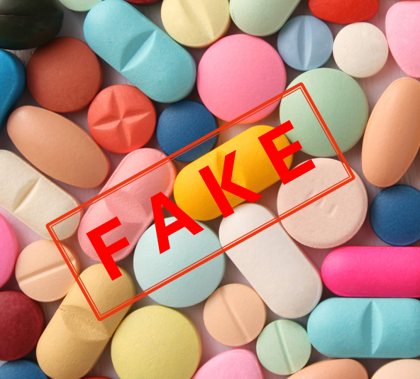 A collection of tablets with a red banner over the top saying Fake in red captial letters